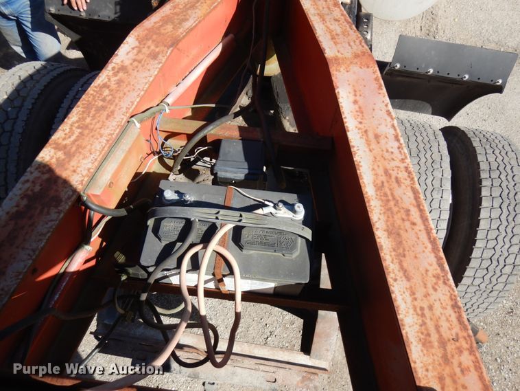 image for item HD9097 2006 Trussmaster roll off tilt deck trailer