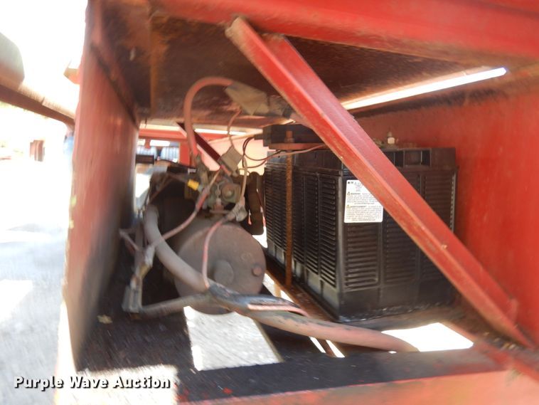 image for item HD9097 2006 Trussmaster roll off tilt deck trailer