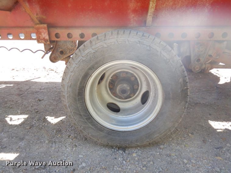 image for item HD9097 2006 Trussmaster roll off tilt deck trailer