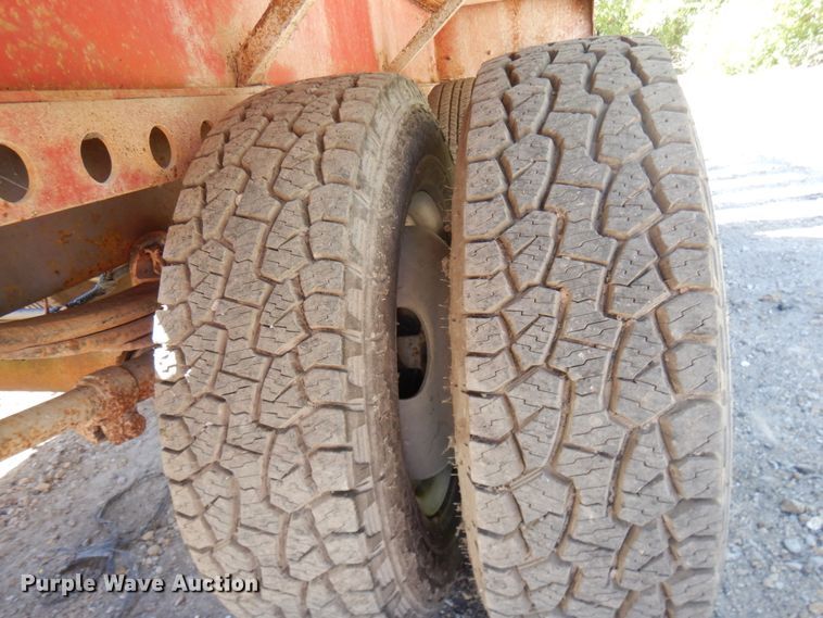 image for item HD9097 2006 Trussmaster roll off tilt deck trailer