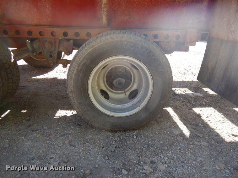 image for item HD9097 2006 Trussmaster roll off tilt deck trailer