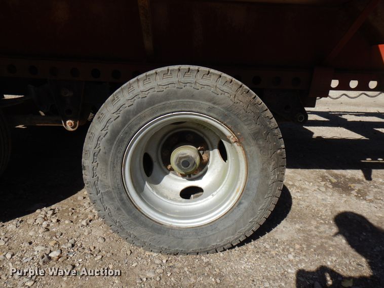 image for item HD9097 2006 Trussmaster roll off tilt deck trailer