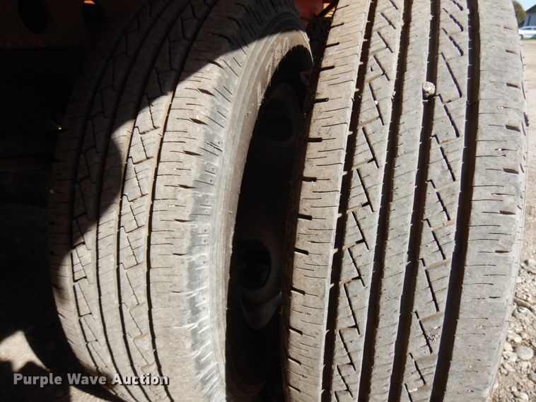 image for item HD9097 2006 Trussmaster roll off tilt deck trailer