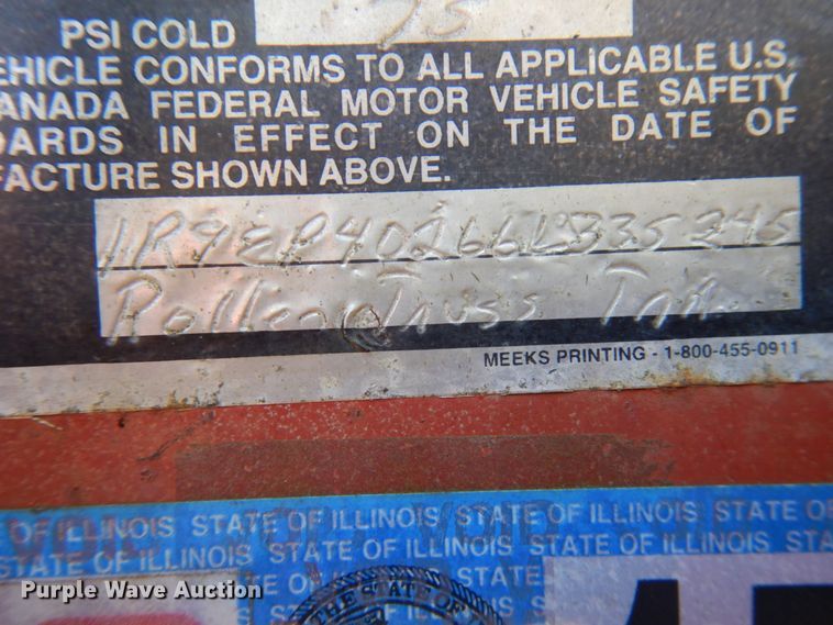 image for item HD9097 2006 Trussmaster roll off tilt deck trailer