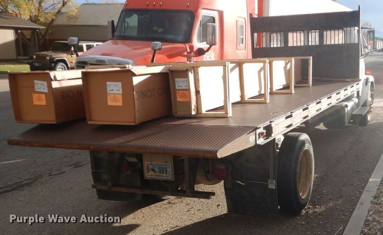 image for item HS9368 1995 Freightliner FL60  dump flatbed truck