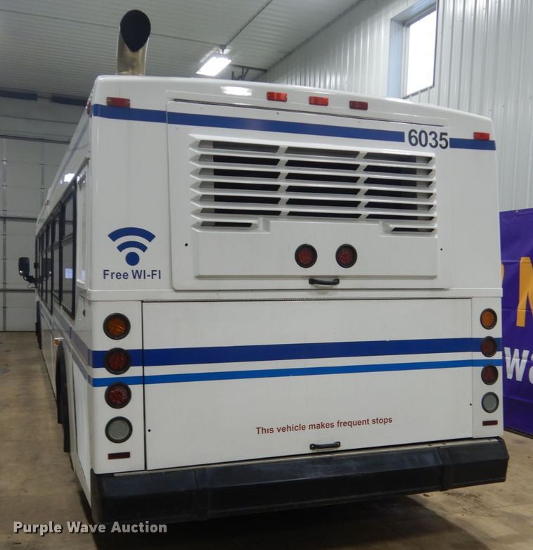 image for item HS9379 2003 New Flyer D40LF  shuttle bus