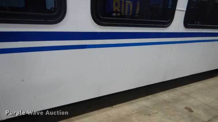 image for item HS9379 2003 New Flyer D40LF  shuttle bus