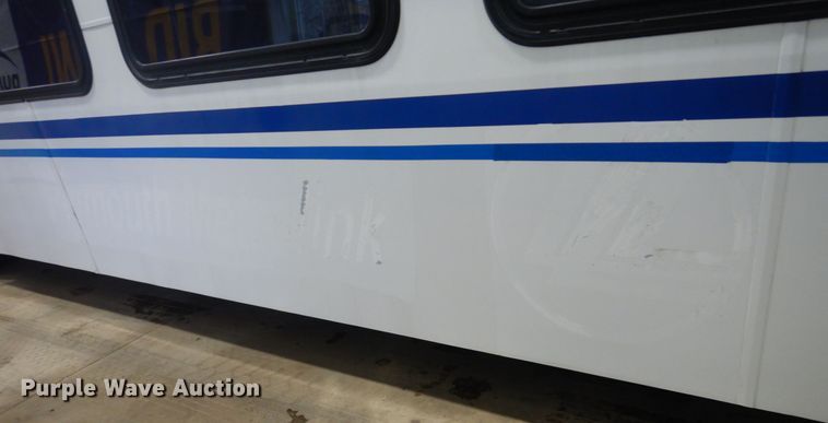 image for item HS9379 2003 New Flyer D40LF  shuttle bus