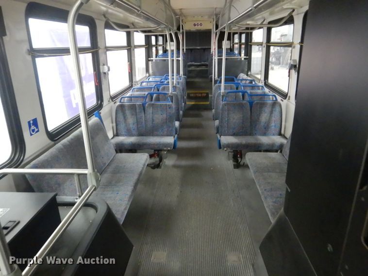 image for item HS9379 2003 New Flyer D40LF  shuttle bus