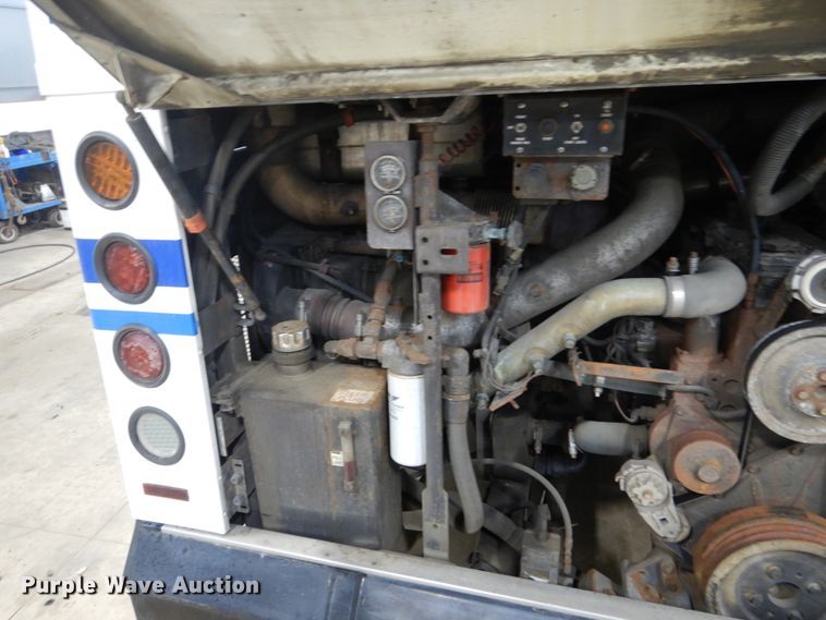 image for item HS9379 2003 New Flyer D40LF  shuttle bus