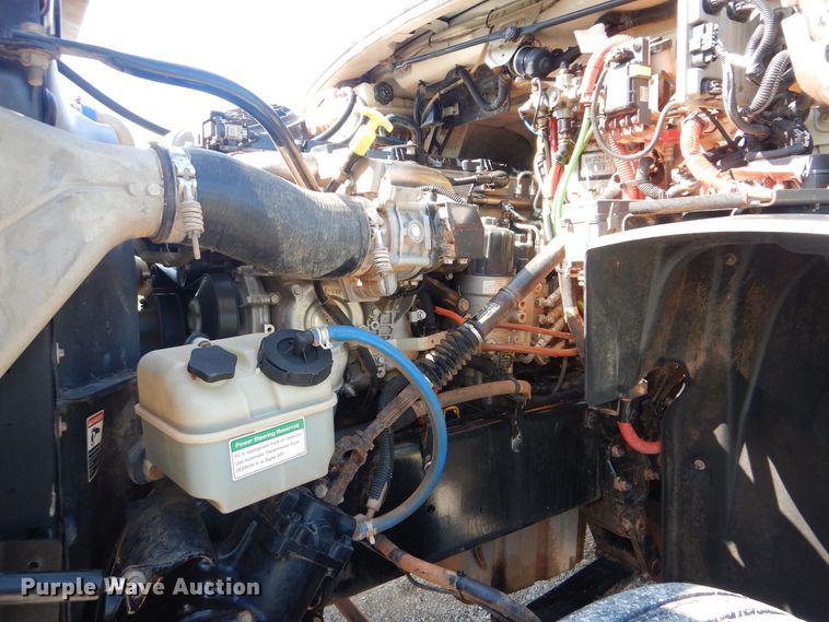 image for item GM9156 2012 Freightliner 114SD  flatbed truck