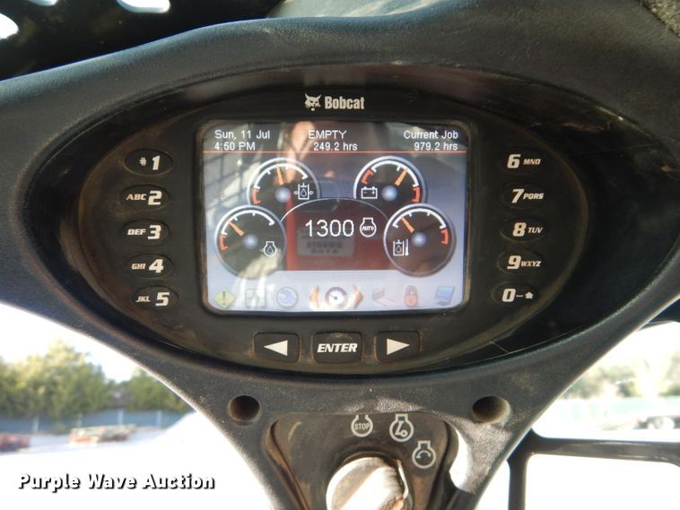 image for item HF9055 2015 Bobcat T750  tracked skid steer loader