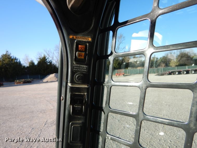 image for item HF9055 2015 Bobcat T750  tracked skid steer loader