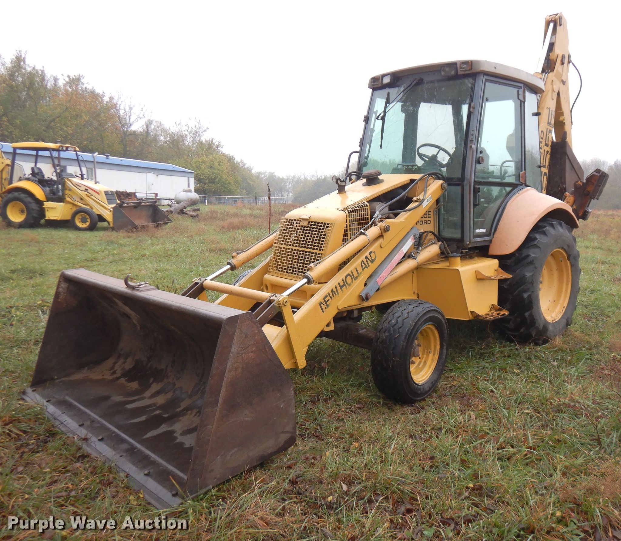 1997 New Holland 555E backhoe in Moran, KS Item FW9806 sold Purple Wave