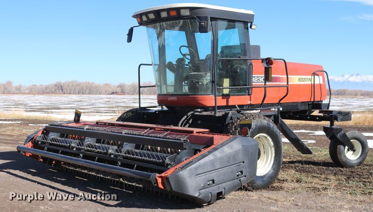 image for item DD6163 2004 Hesston 9230  windrower