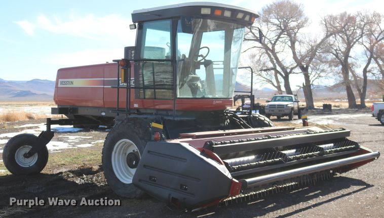 image for item DD6163 2004 Hesston 9230  windrower