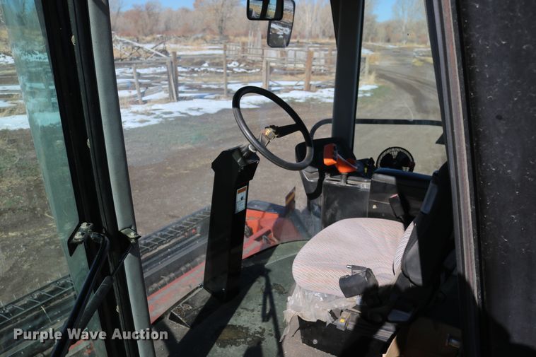 image for item DD6163 2004 Hesston 9230  windrower