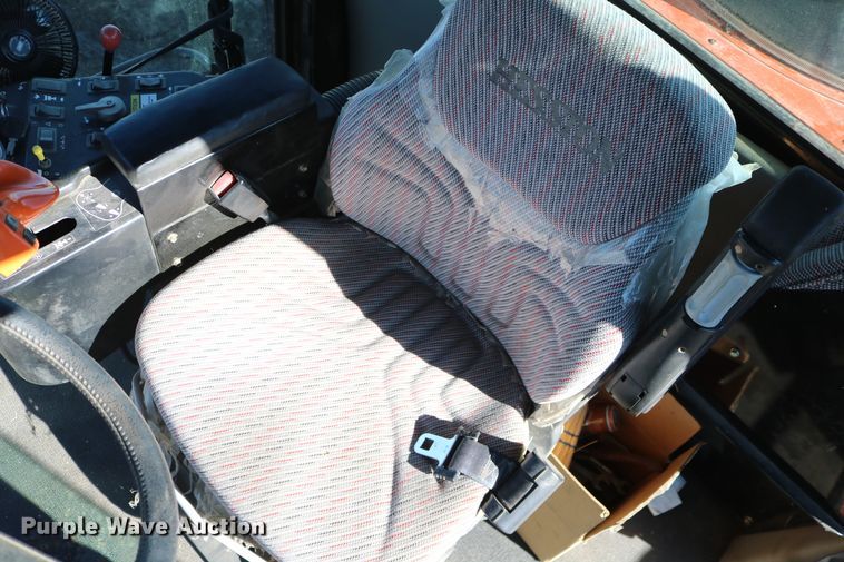 image for item DD6163 2004 Hesston 9230  windrower