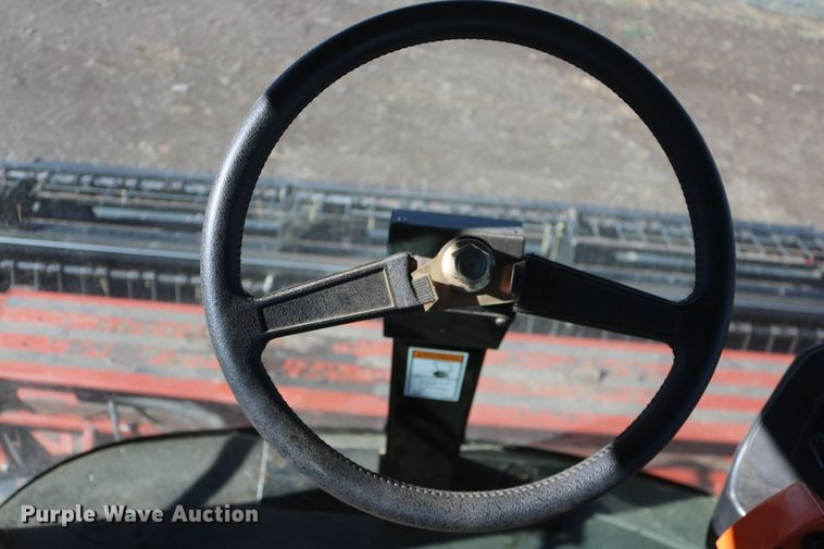 image for item DD6163 2004 Hesston 9230  windrower