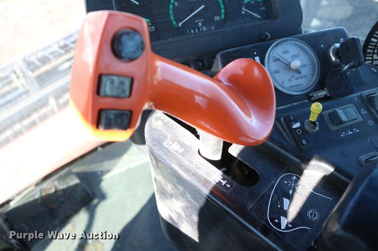 image for item DD6163 2004 Hesston 9230  windrower