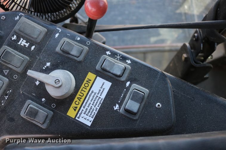 image for item DD6163 2004 Hesston 9230  windrower