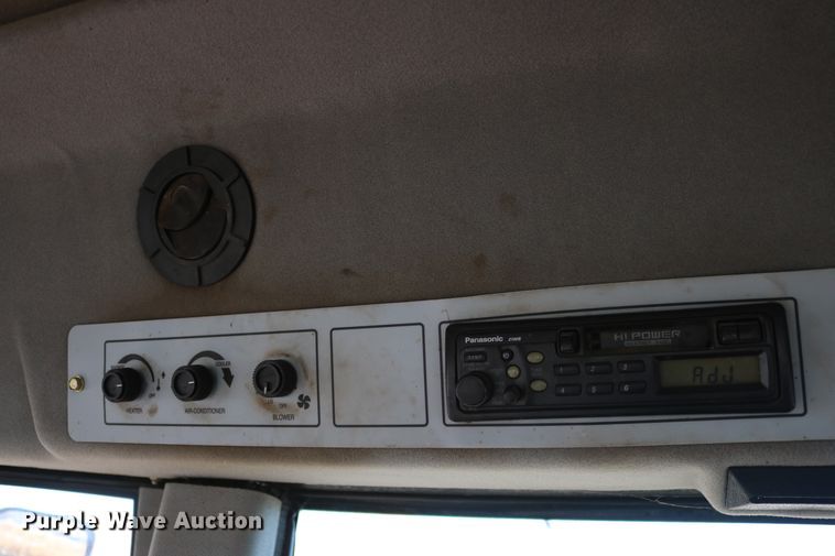 image for item DD6163 2004 Hesston 9230  windrower