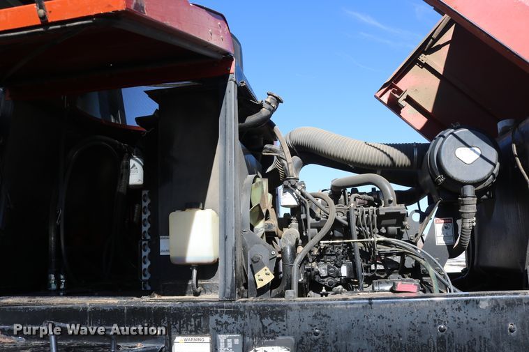 image for item DD6163 2004 Hesston 9230  windrower