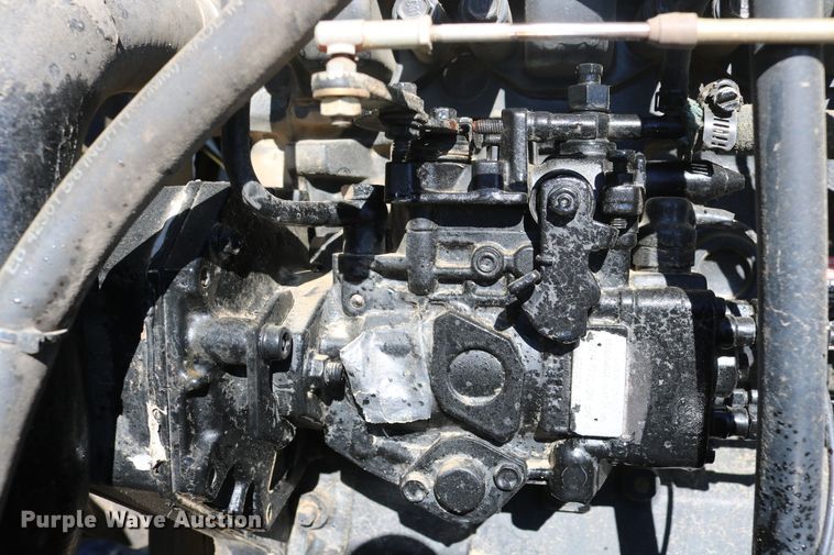 image for item DD6163 2004 Hesston 9230  windrower