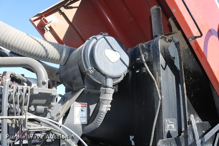 image for item DD6163 2004 Hesston 9230  windrower