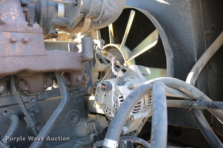 image for item DD6163 2004 Hesston 9230  windrower