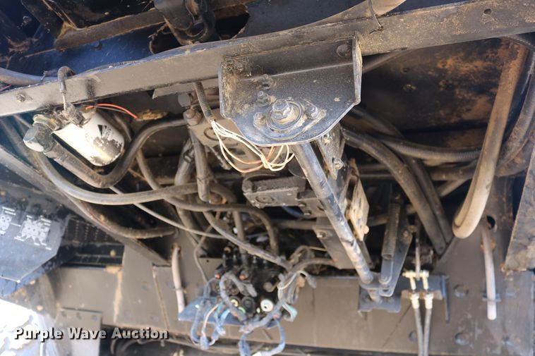 image for item DD6163 2004 Hesston 9230  windrower