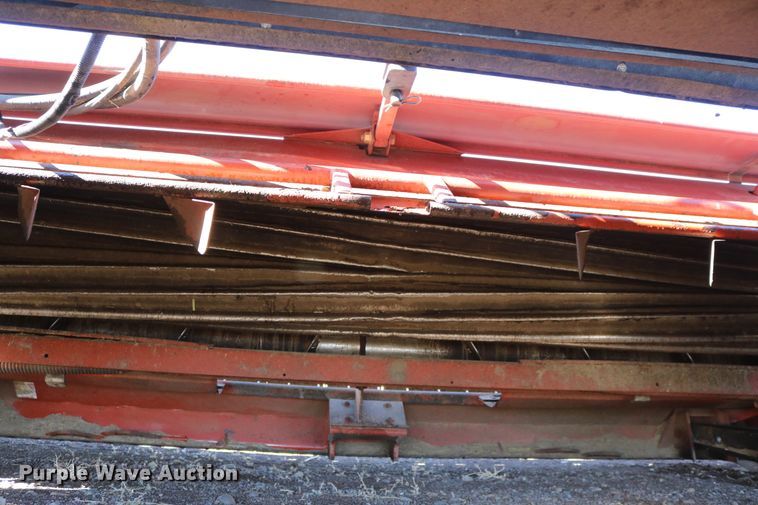 image for item DD6163 2004 Hesston 9230  windrower