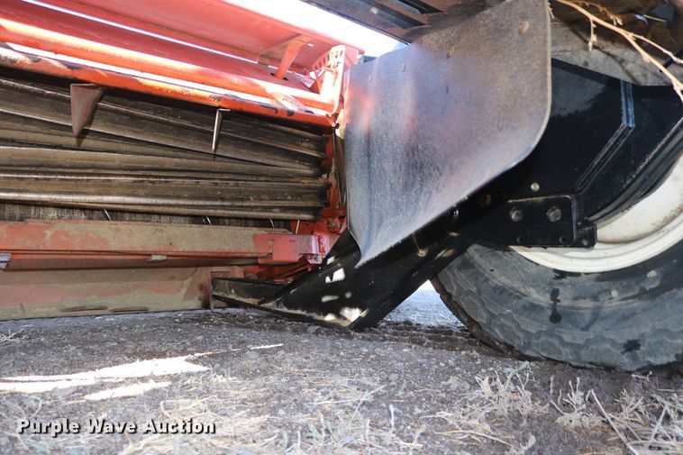 image for item DD6163 2004 Hesston 9230  windrower