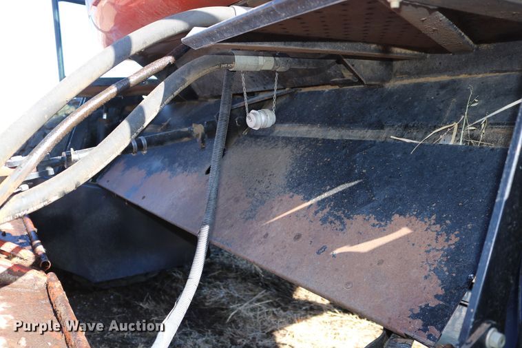 image for item DD6163 2004 Hesston 9230  windrower