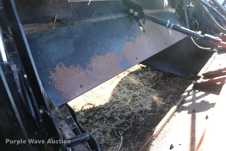 image for item DD6163 2004 Hesston 9230  windrower