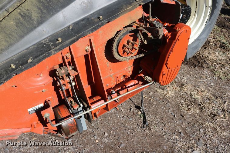 image for item DD6163 2004 Hesston 9230  windrower