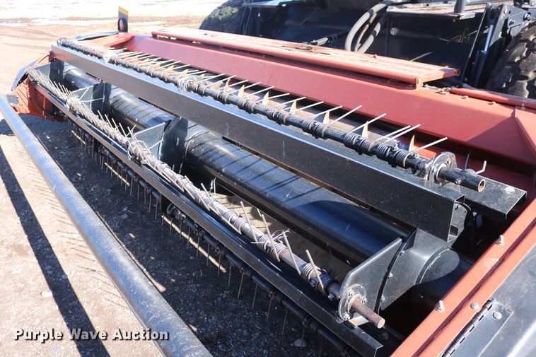 image for item DD6163 2004 Hesston 9230  windrower