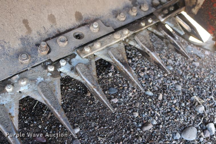 image for item DD6163 2004 Hesston 9230  windrower