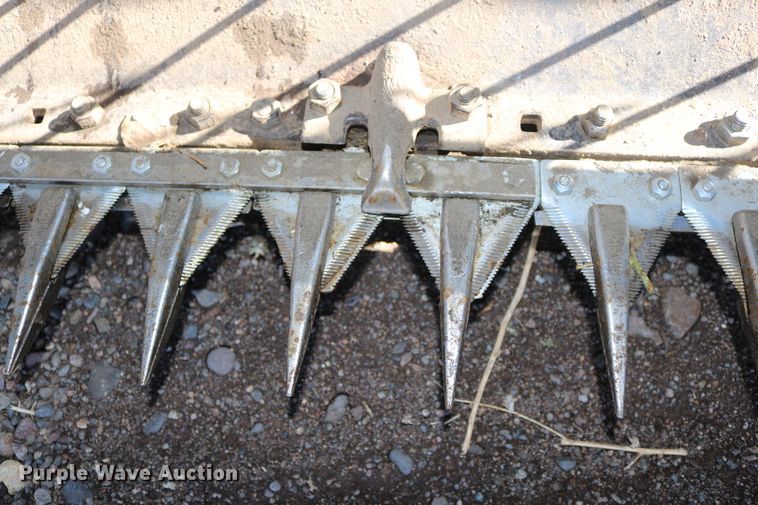 image for item DD6163 2004 Hesston 9230  windrower