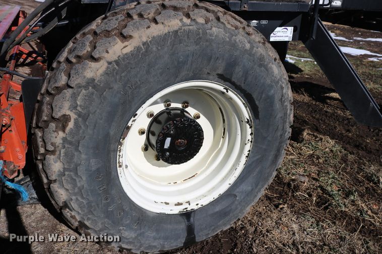 image for item DD6163 2004 Hesston 9230  windrower