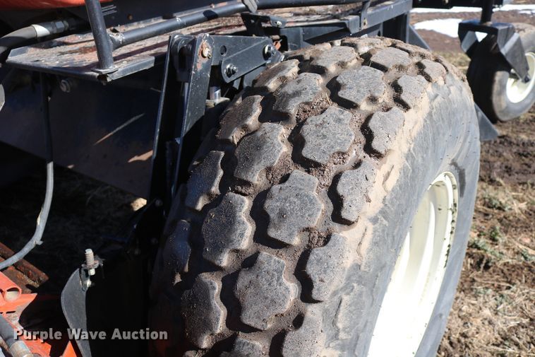 image for item DD6163 2004 Hesston 9230  windrower