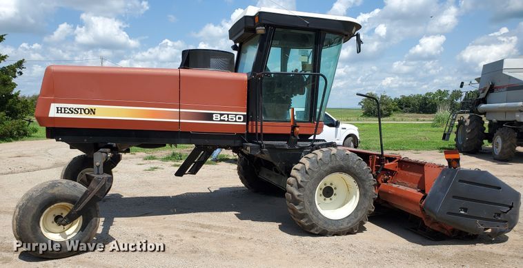 image for item DJ3163 2002 Hesston 8450  windrower