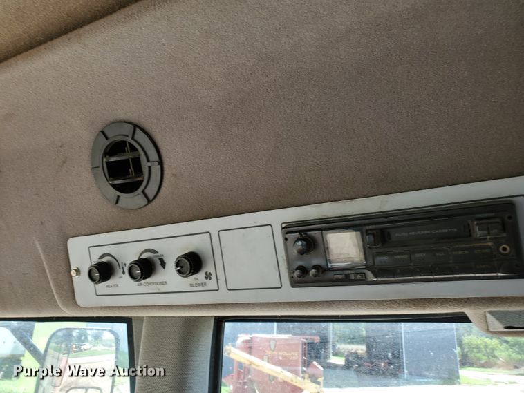 image for item DJ3163 2002 Hesston 8450  windrower