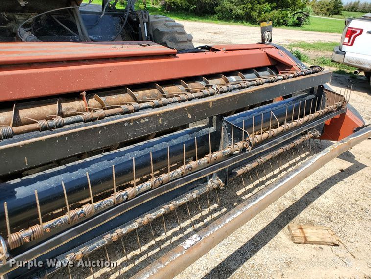 image for item DJ3163 2002 Hesston 8450  windrower