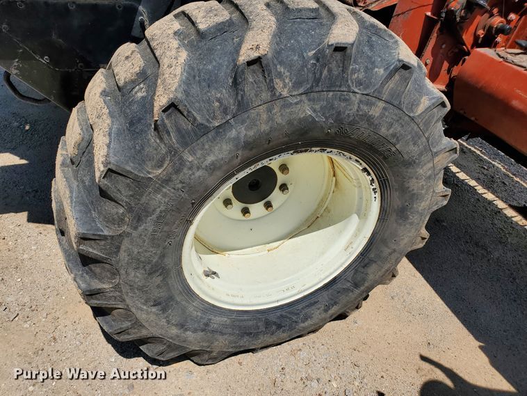 image for item DJ3163 2002 Hesston 8450  windrower