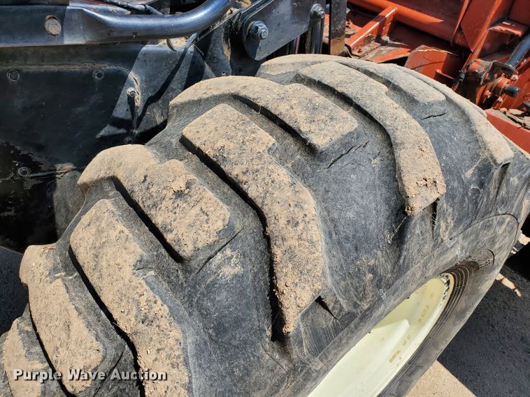 image for item DJ3163 2002 Hesston 8450  windrower