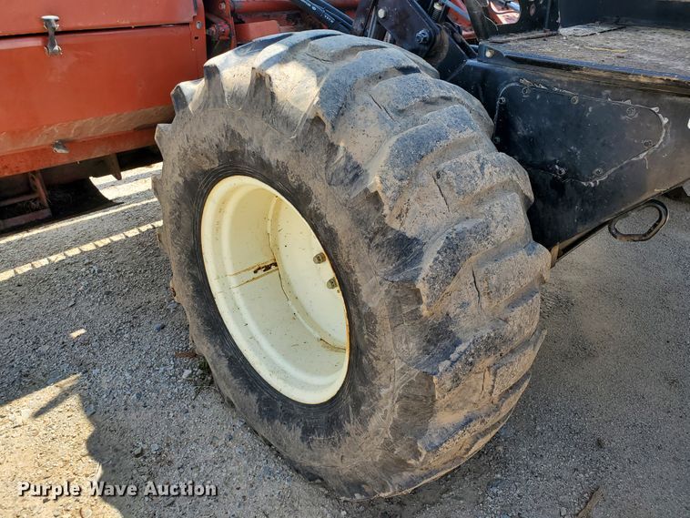 image for item DJ3163 2002 Hesston 8450  windrower