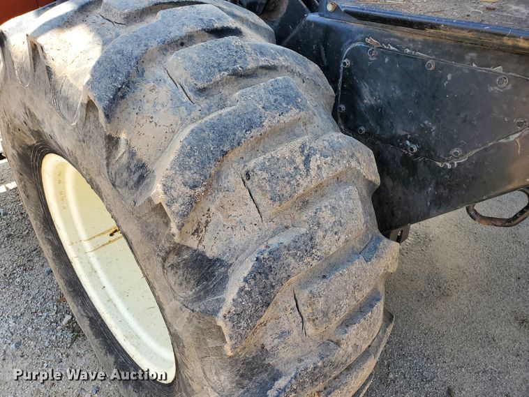 image for item DJ3163 2002 Hesston 8450  windrower