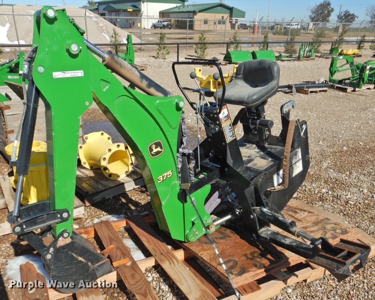 image for item HU9644 John Deere 375 backhoe attachment