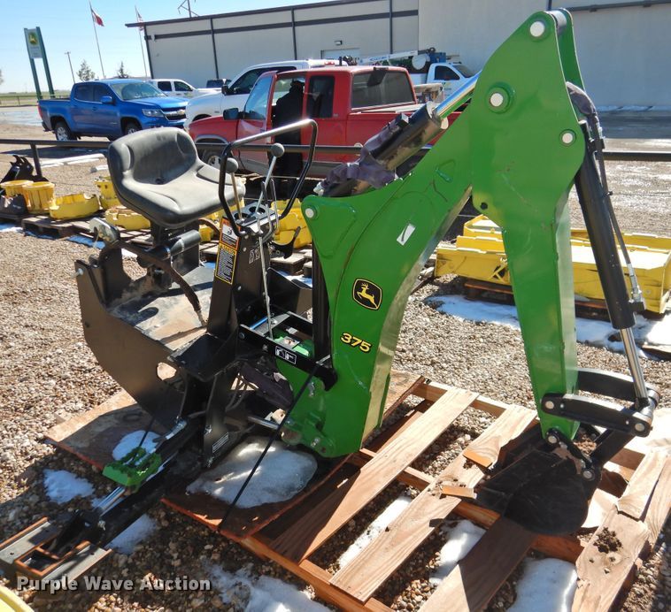 image for item HU9644 John Deere 375 backhoe attachment